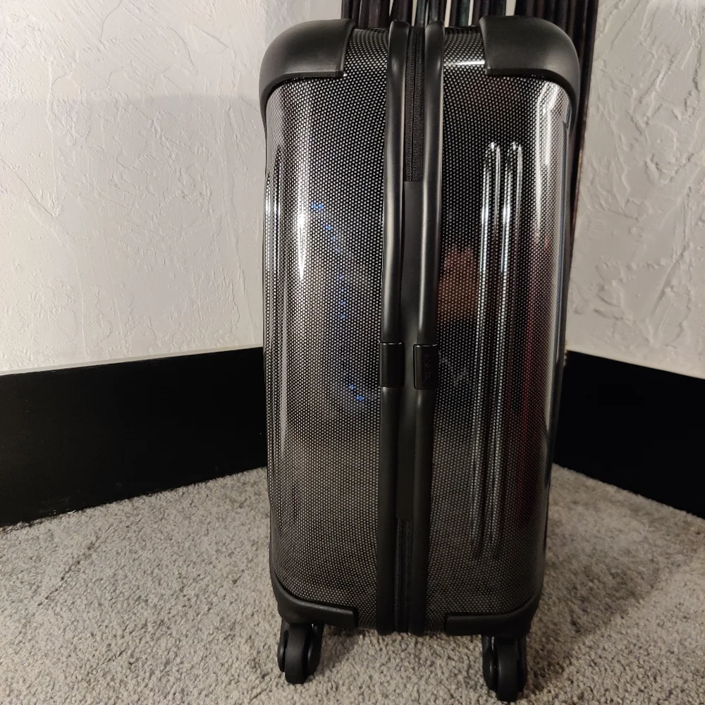 Tumi •upgrade your